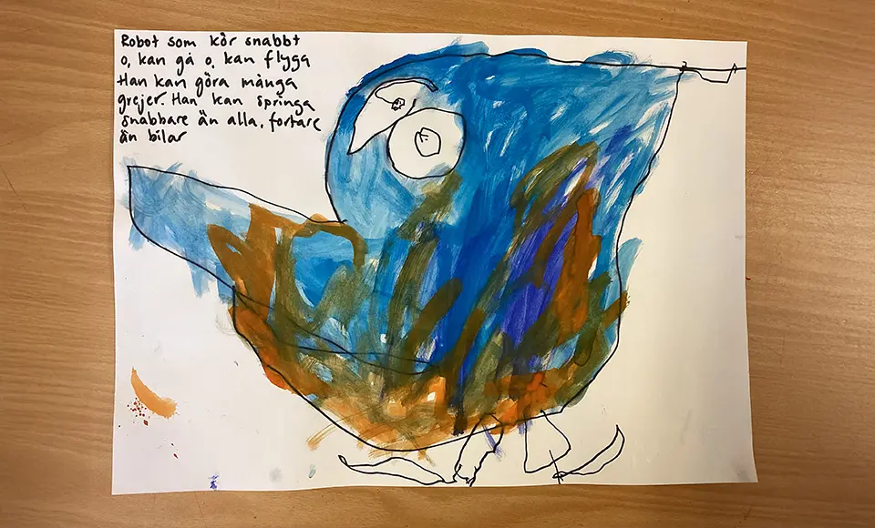 En teckning på en blå robot målad av ett barn.