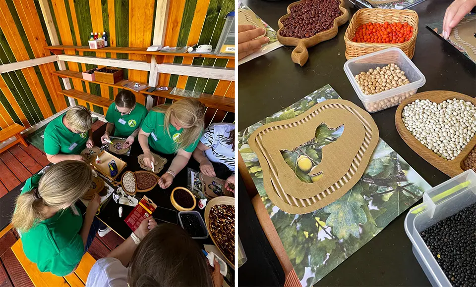 Några personer sitter vid ett bord och pysslar med bönor som de klistrar upp på tavlor.